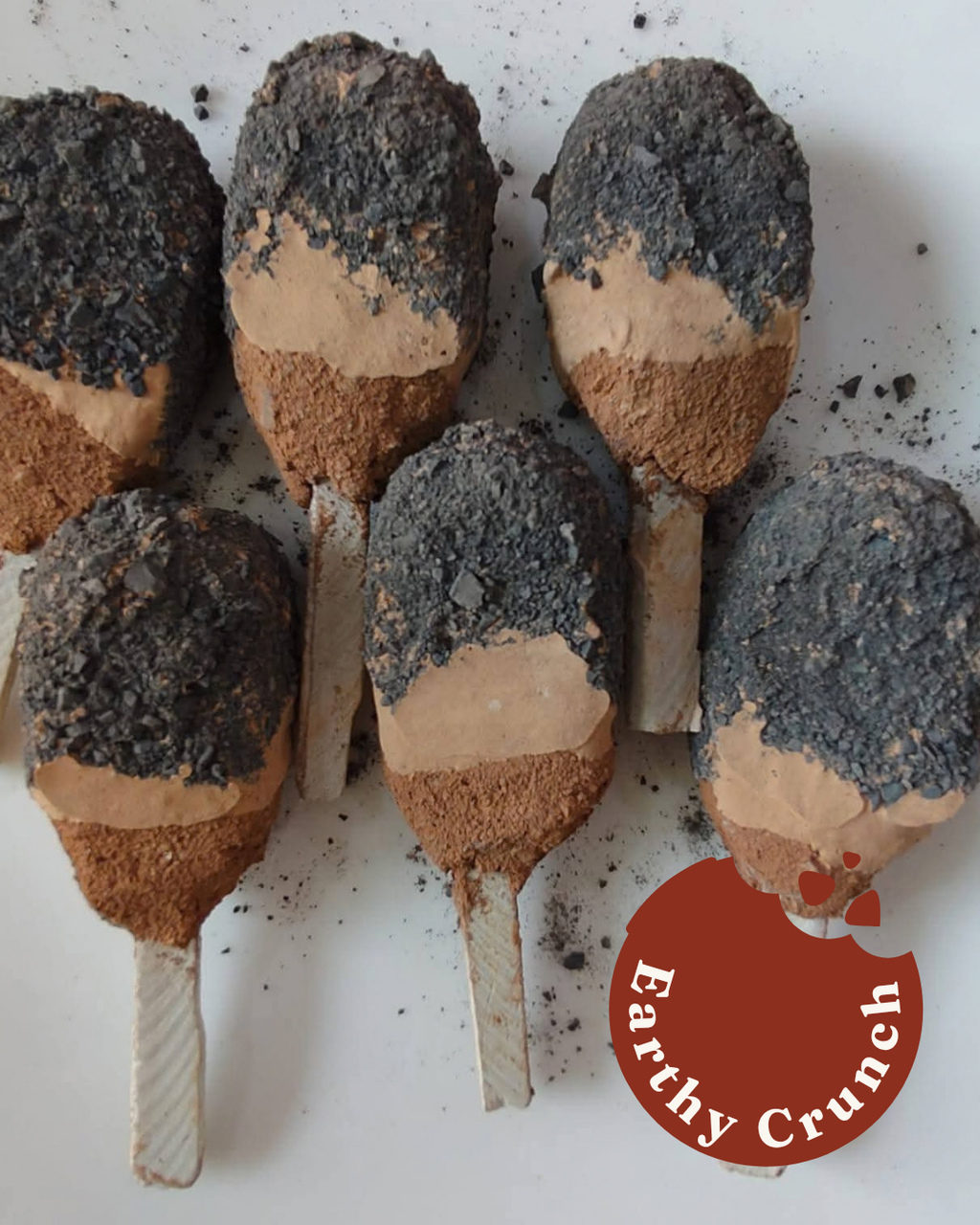 Galaxy Pops -  Layered red clays rolled in chalk paste and smoky crumbs (Edible Clay Treats)